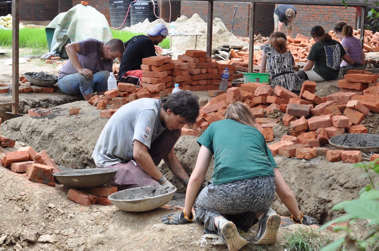 Projects Abroad volunteers help to build classrooms as part of their building volunteer work in Nepal. Volunteers with Projects Abroad help to build classrooms during their building volunteer work in Nepal.